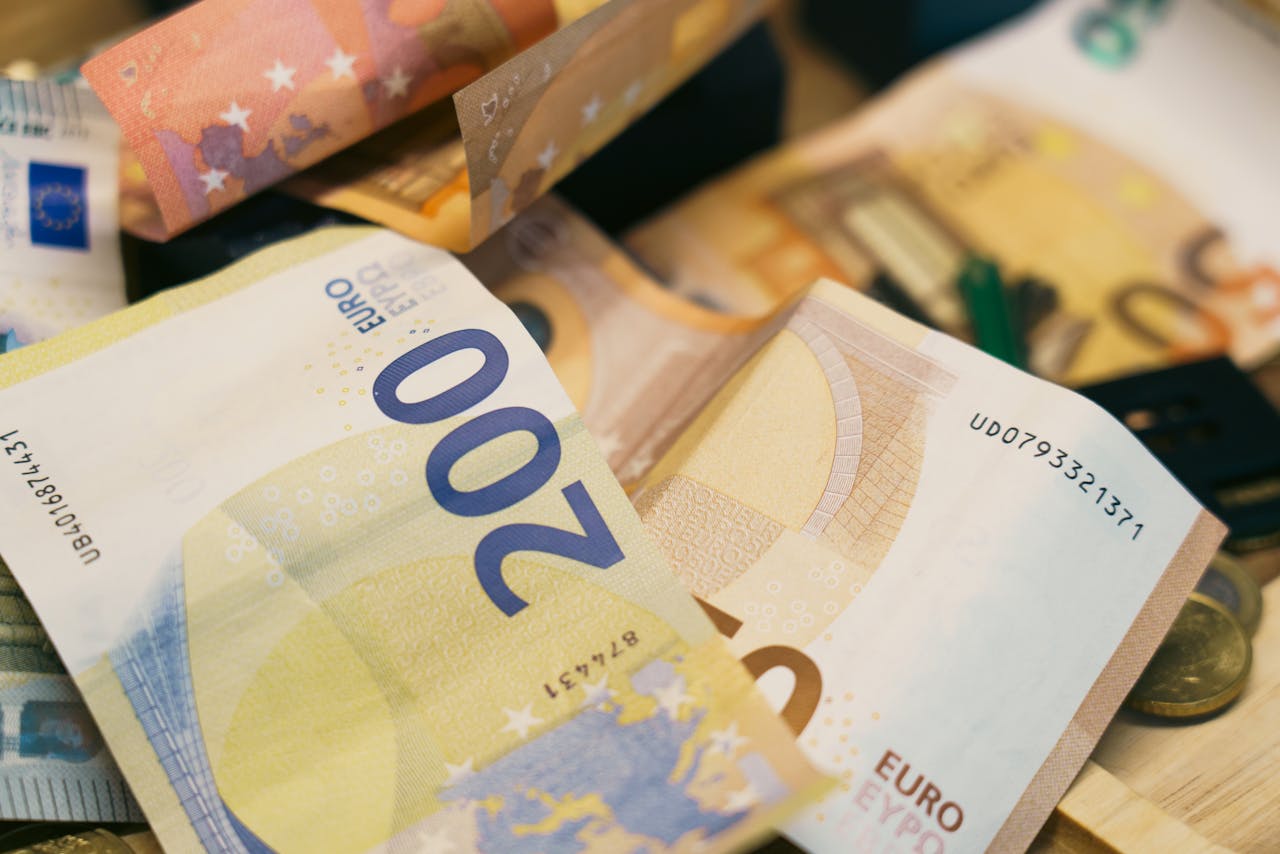 services-04 Close-up of assorted euro banknotes symbolizing finance, currency, and budget management.